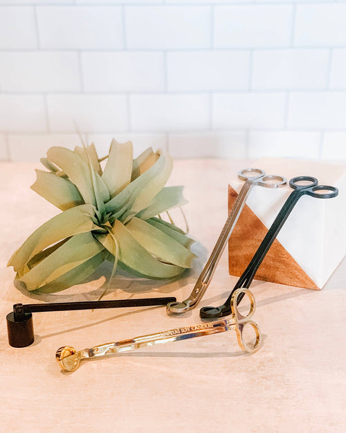A Gold Wick Trimmer