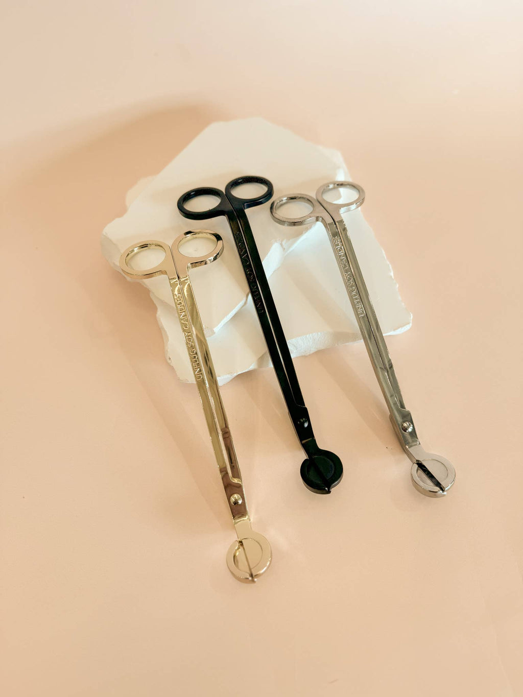 A Gold Wick Trimmer
