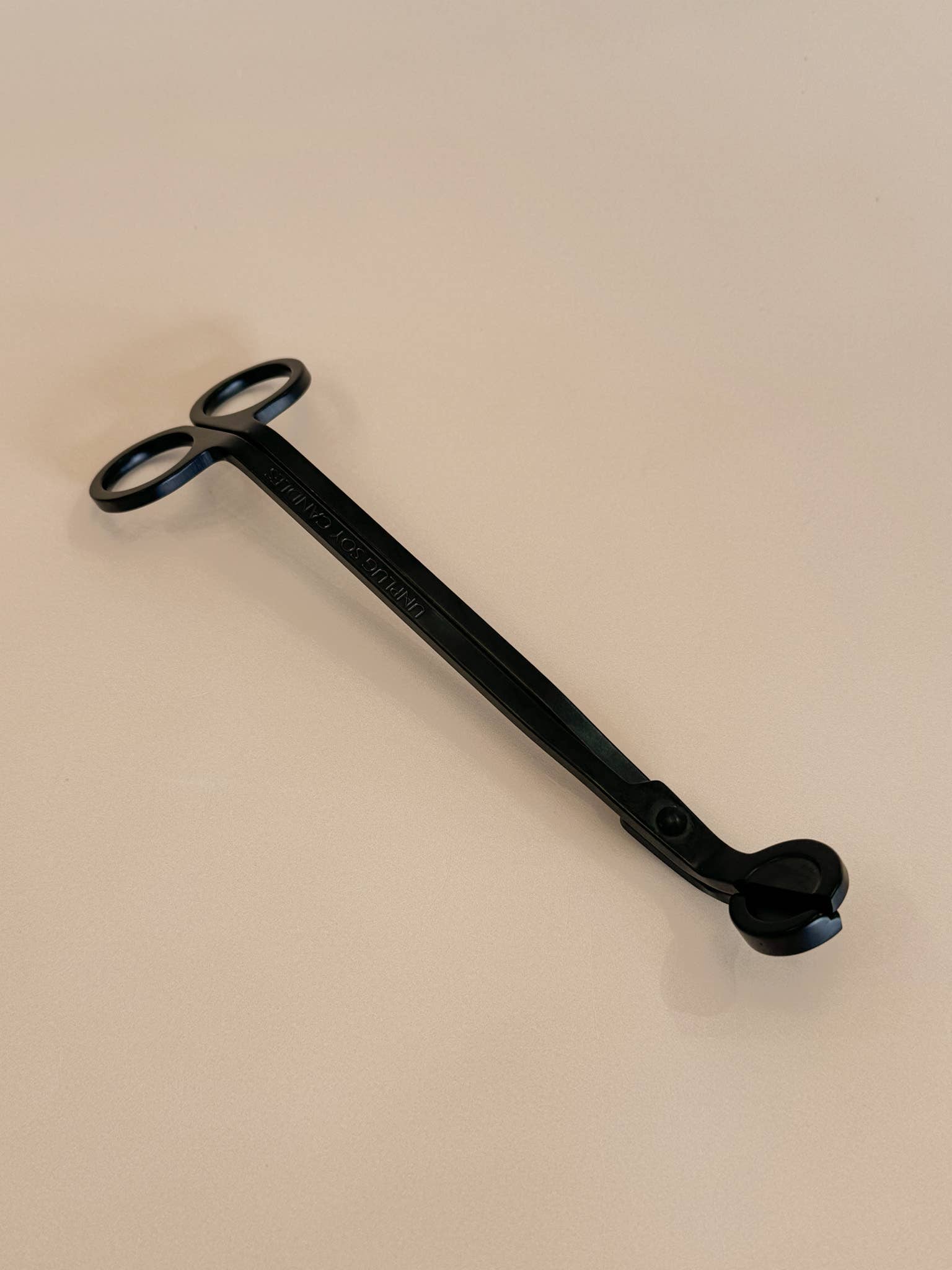 A Gold Wick Trimmer