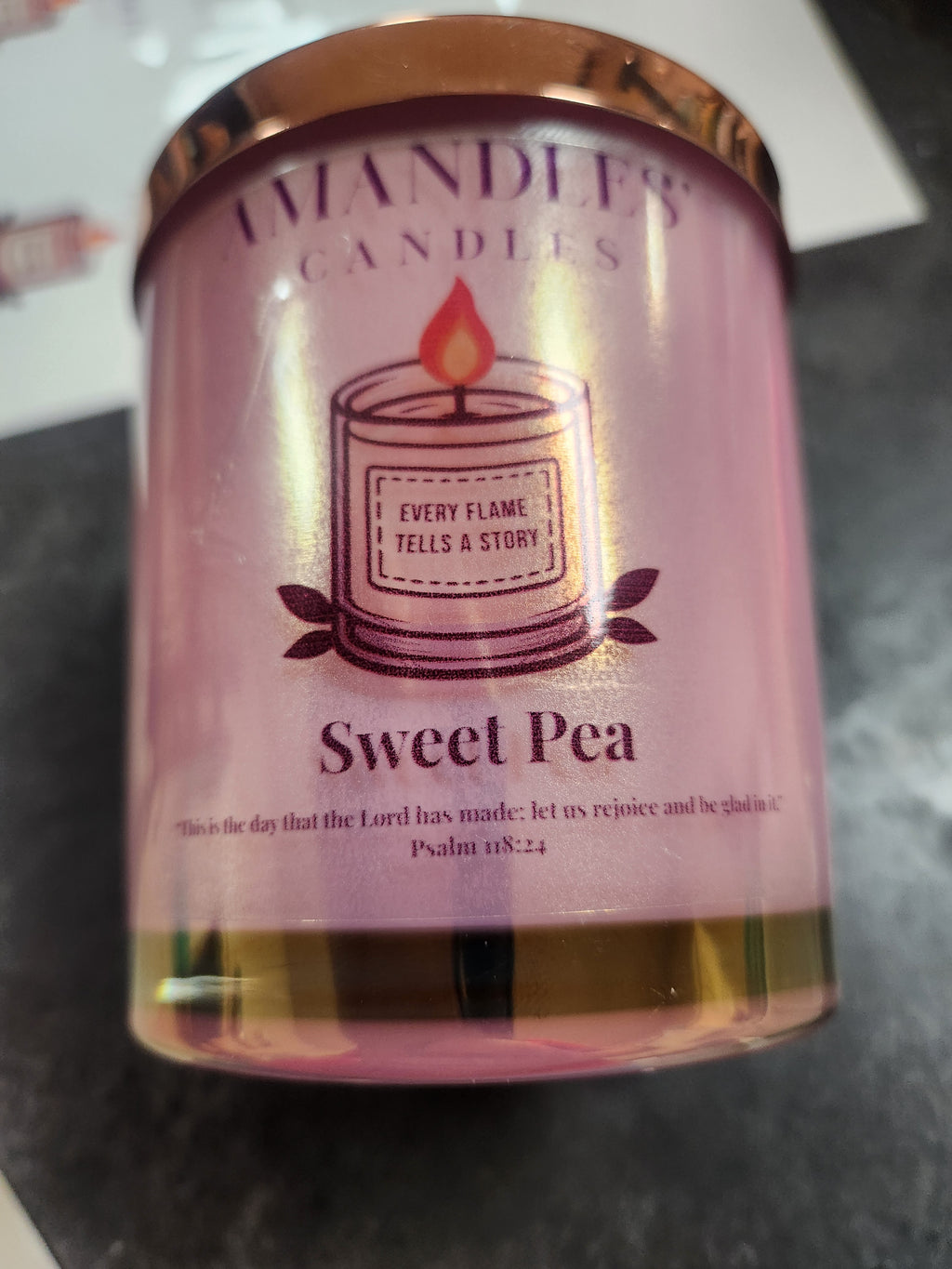 Sweet pea 14oz Soy wax scented candle that is vibrant, youthful, and cheerful blend of dewy florals, crisp fruits, and soft musks.. Sweet pea delivers a playful, spring-like freshness with a slightly honeyed sweetness.